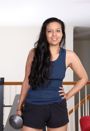 18 year old girl Agnes uncovers her perky tits as she gets completely naked